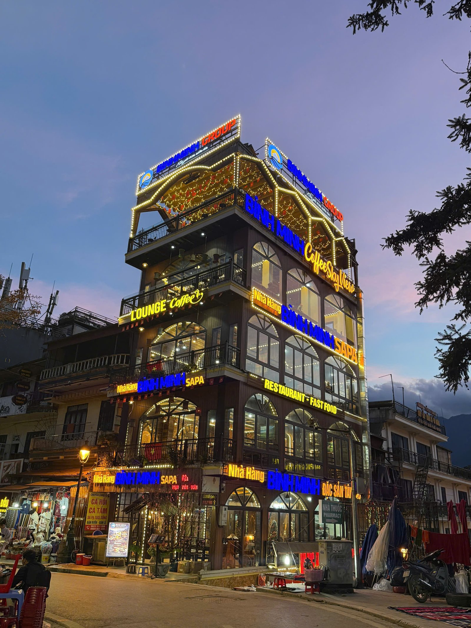 Interior of a luxury hotel room with warm lighting and wooden furniture